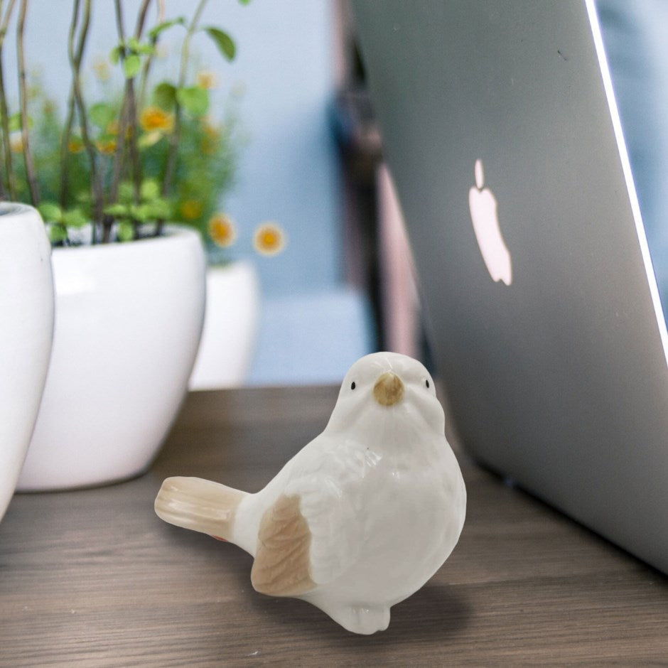 Petit oiseau décoratif en céramique blanc et beige