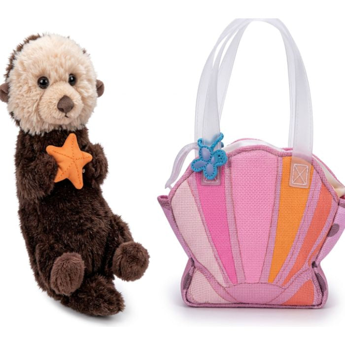 Peluche loutre de mer avec un sac