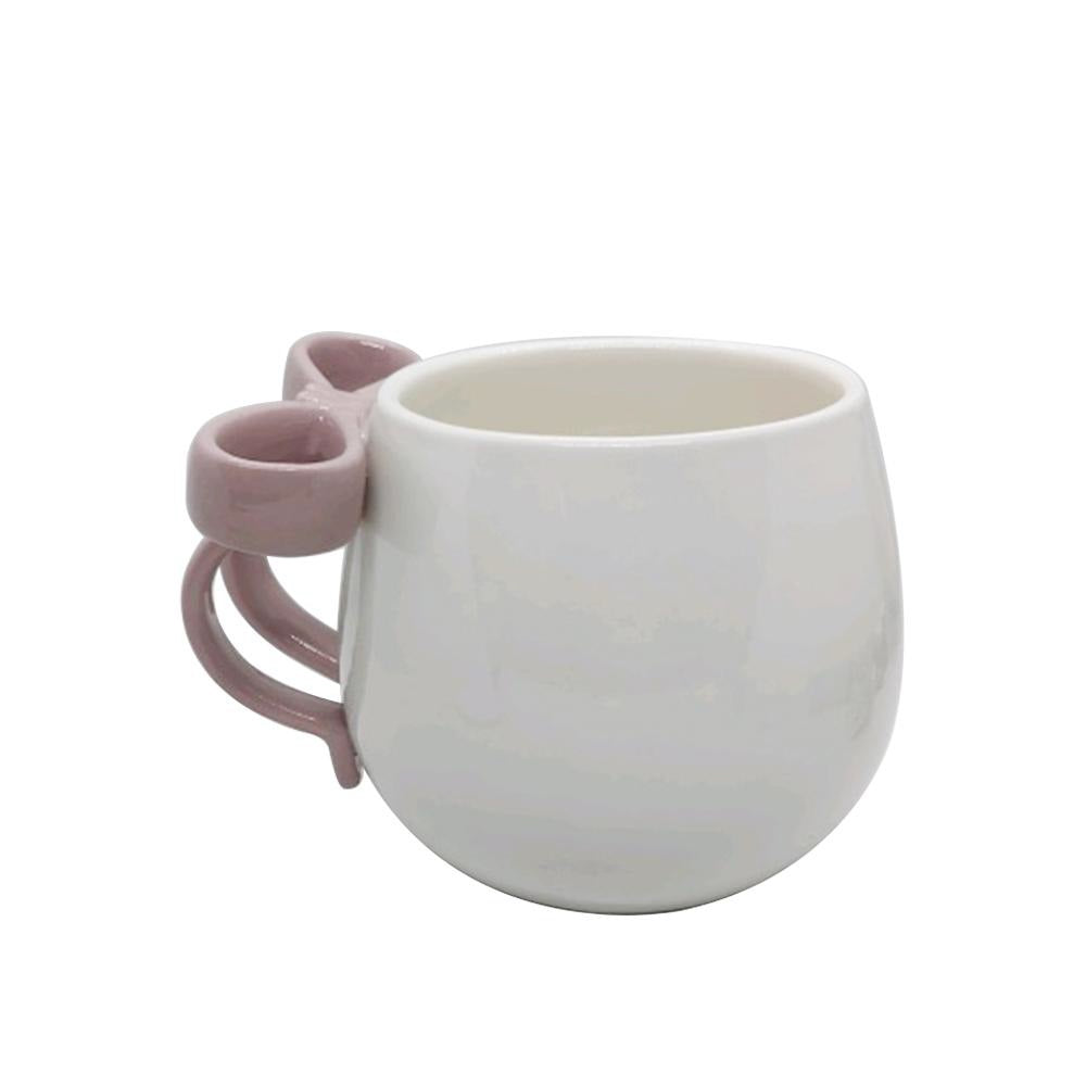 Tasse à café avec boucle rose