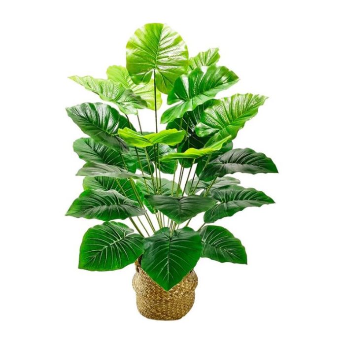 Plante verte artificielle dans un pot beige