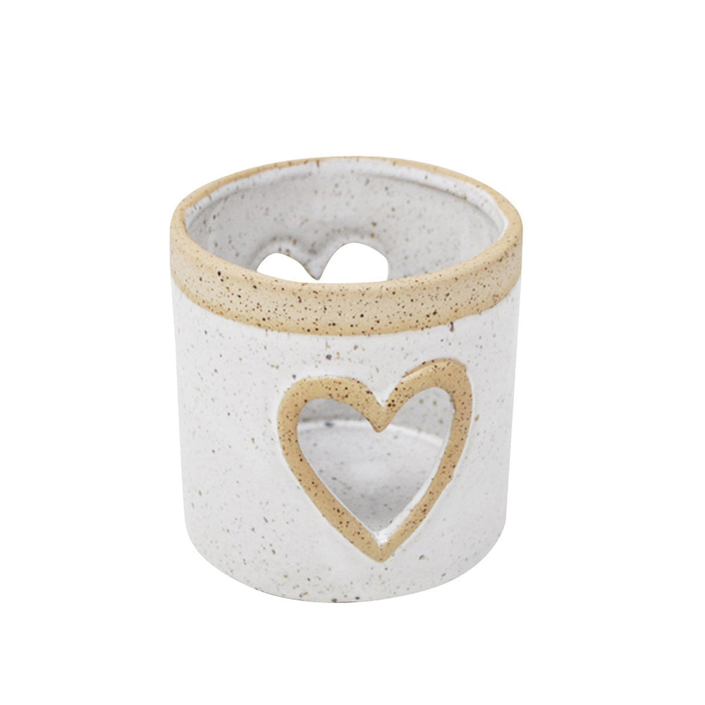 Bougeoir blanc avec creux en forme de coeur
